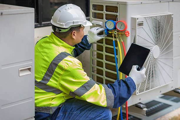 Professional Hvac technician working in Hooper, UT